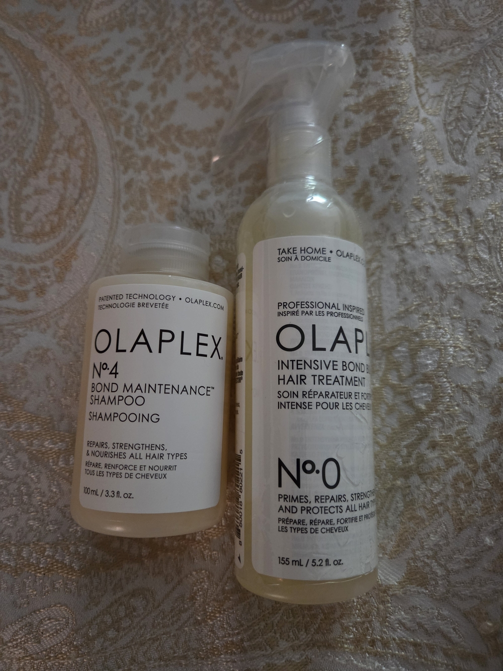 Olaplex No.4 Bond Maintenance Shampoo & No.0 Intensive Bond Treatment - White